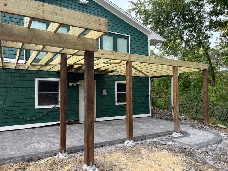 New Deck and Custom Concrete Patio Project Near Completion image