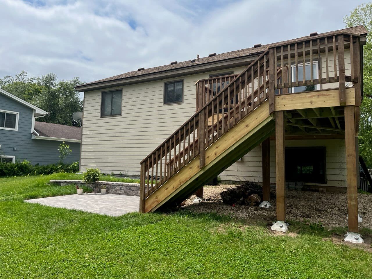 Elevate Your Outdoors with a New Deck and Patio